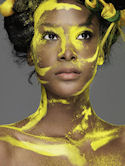 Teyona with yellow powder during America's Next Top Model Photoshoot