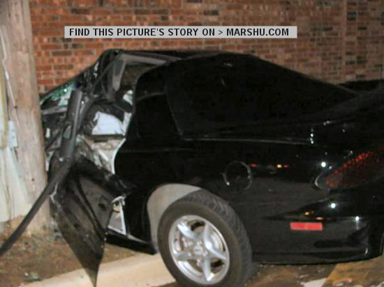 Car accident: driver's side door into a telephone pole